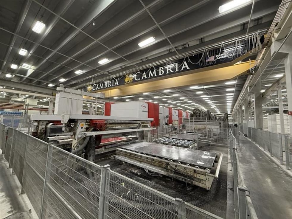 Cambria's stone fabrication facility shows the industrial equipment used to cut and shape...