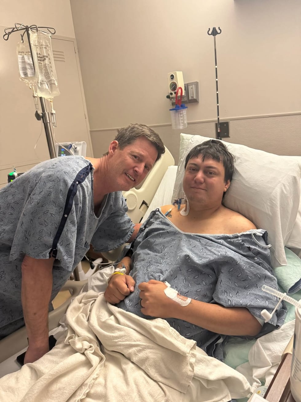 Tyler Jordan, 31, was hospitalized for a kidney transplant. His father Jimmy Jordan (left) was...